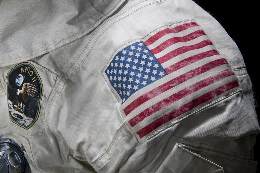 Close up Neil Armstrong's Apollo 11 spacesuit showing an American flag on the shoulder